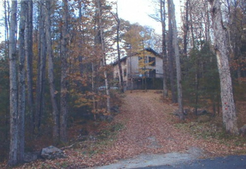 The front of the house in autumn.